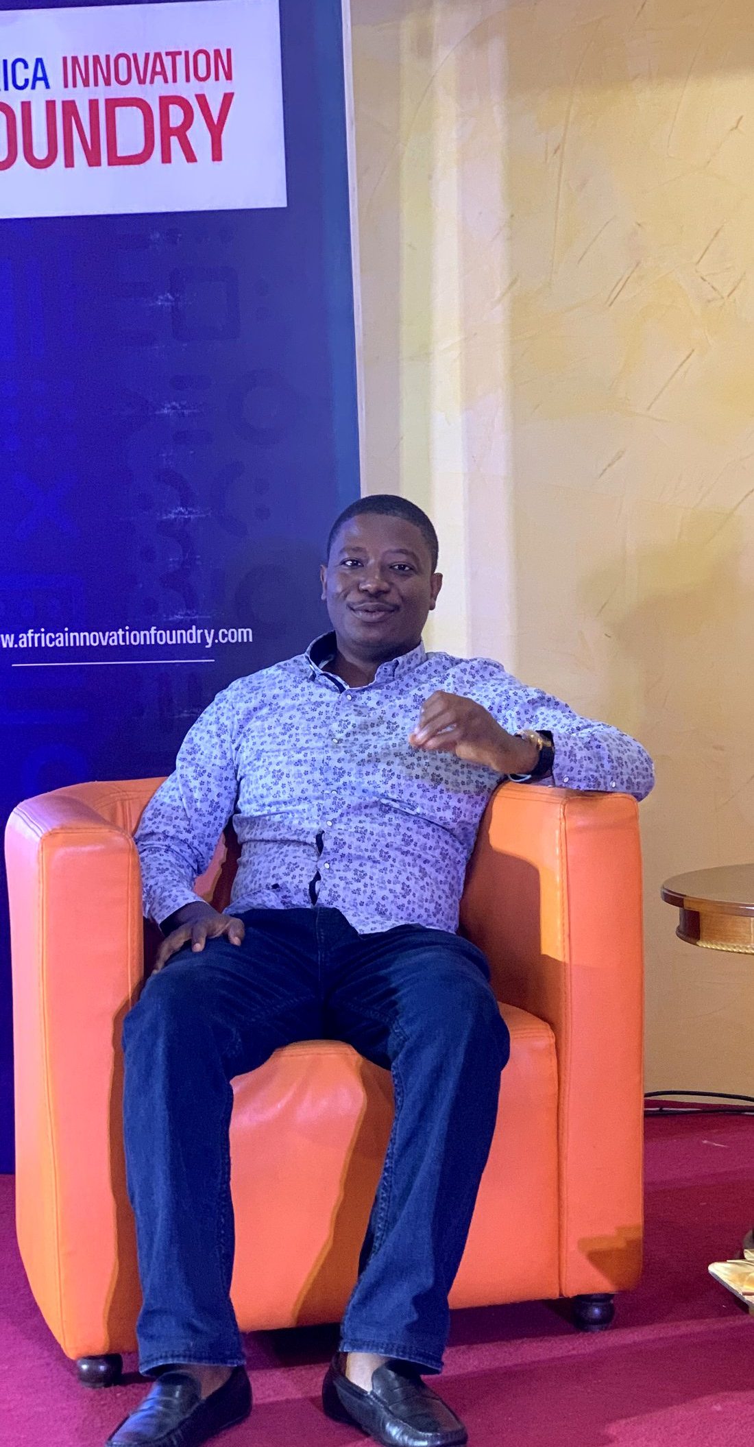 Samson Tanko speaking on stage at Africa Innovation Foundry in Abuja